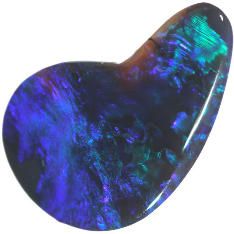 RARE !! OPALE NOIRE ET MULTICOLORE D'ETHIOPIE : 1,07 CARAT